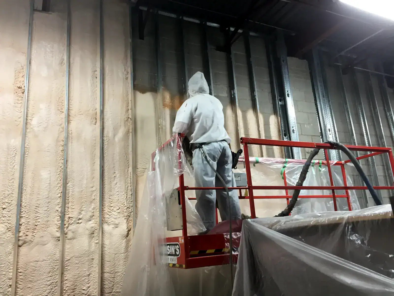 Professional spray foam insulation installation on commercial wall by certified Spray Foam GL technicians in the GTA.