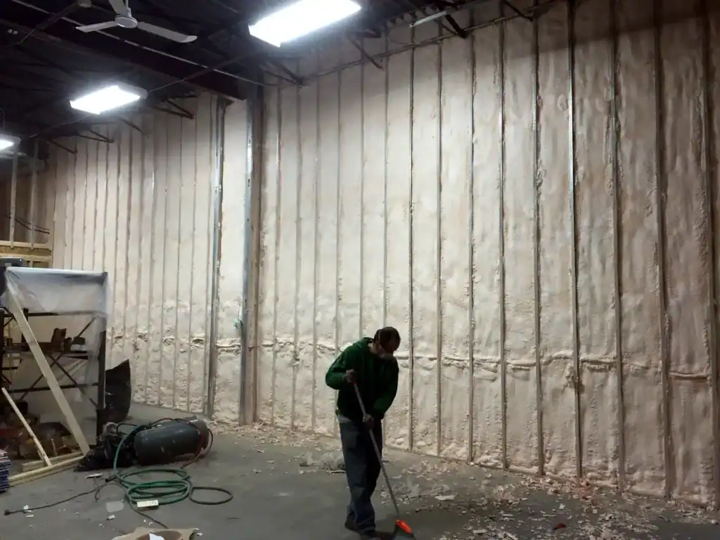 Spray foam insulation applied to interior wall cavity for air sealing and thermal performance