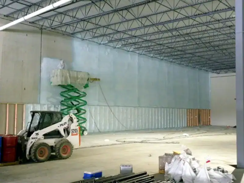 Spray foam insulation installed in a commercial or industrial building for energy efficiency